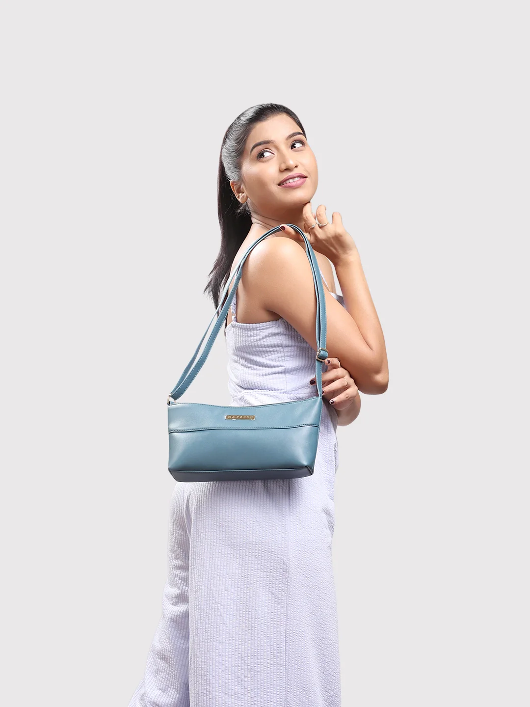 Caprese Clairice Small Teal Sling Bag - Image 3