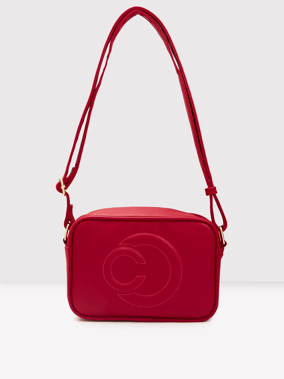 Caprese Dora Medium Burgundy Sling Bag