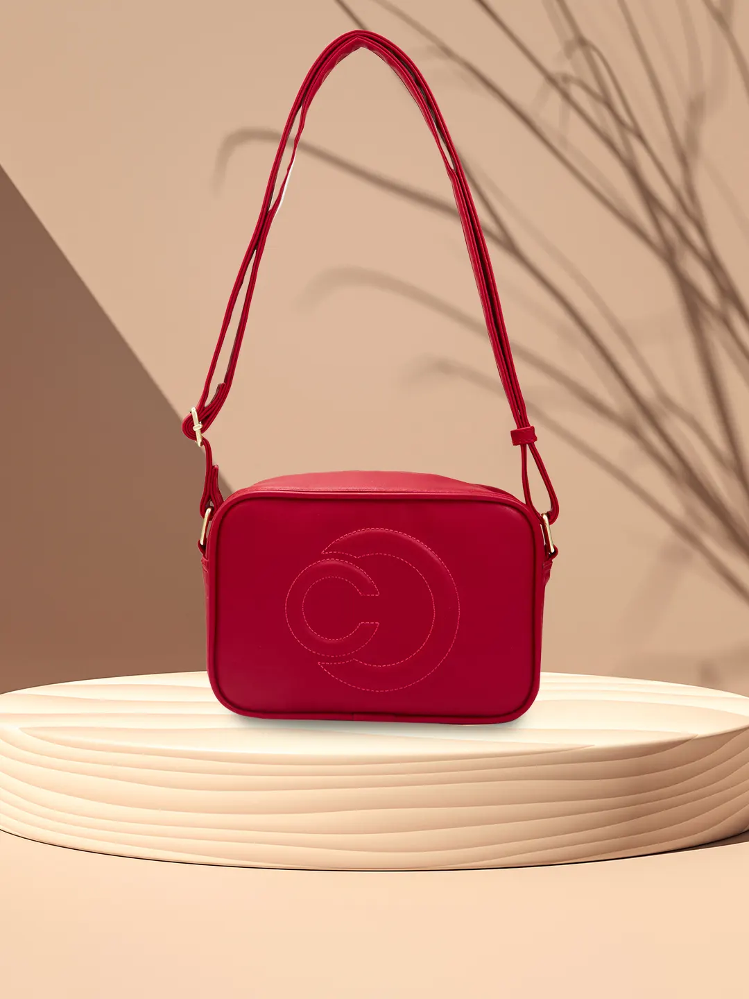 Caprese Dora Medium Burgundy Sling Bag - Image 14