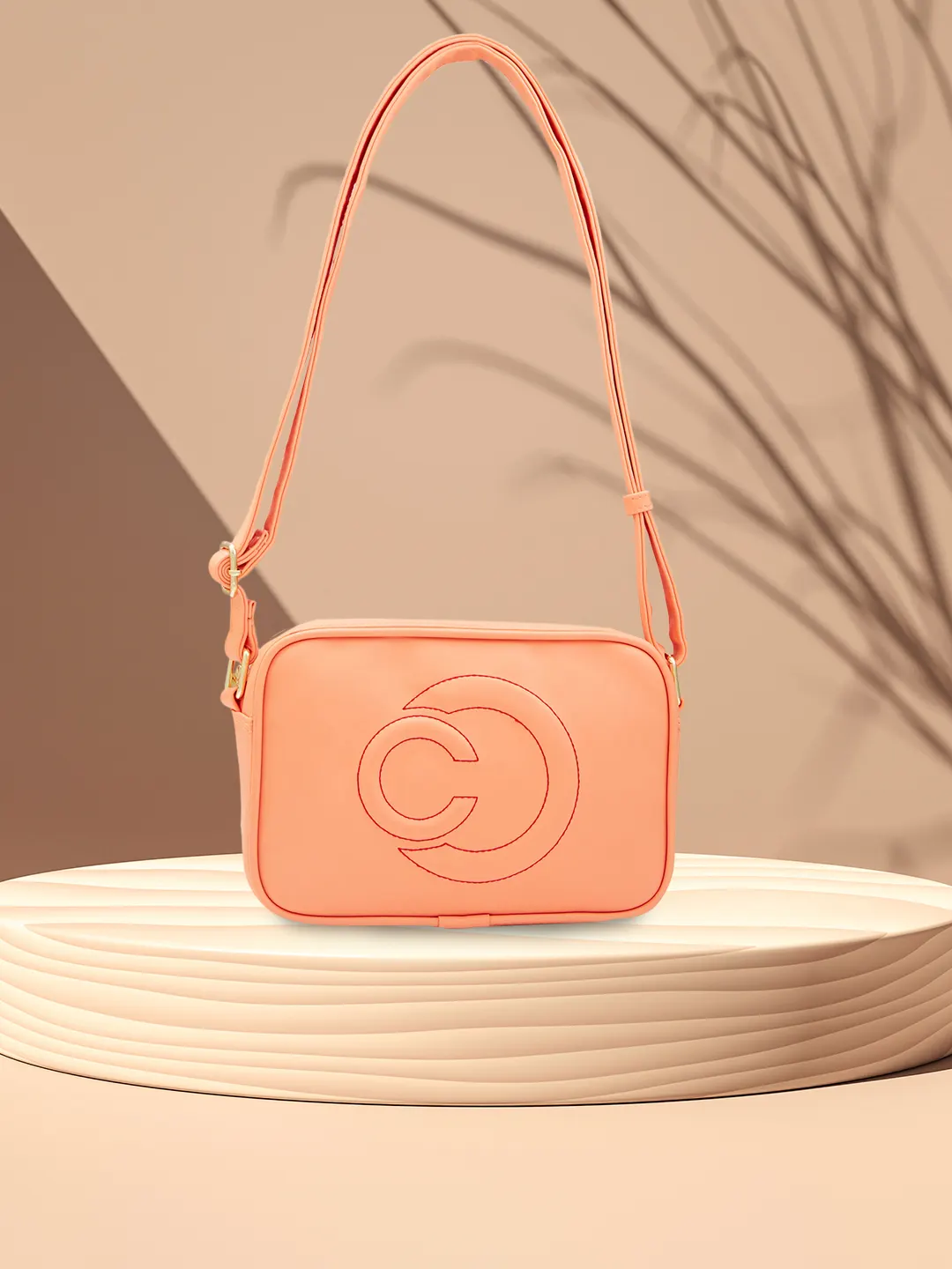 Caprese Dora Medium Coral Sling Bag - Image 13