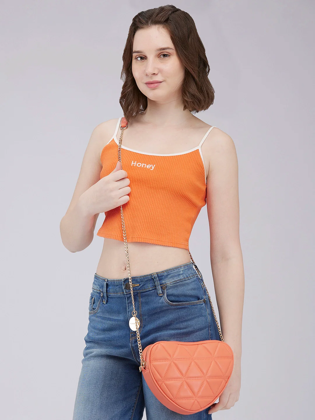 Caprese Hearty Small Coral Crossbody Bag - Image 11