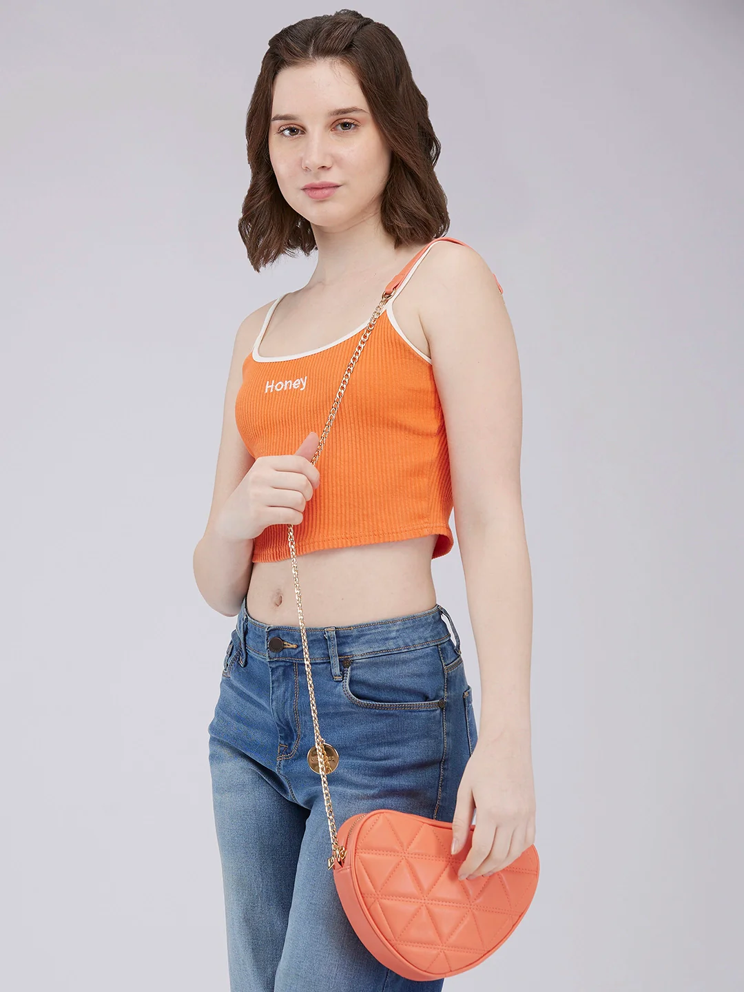 Caprese Hearty Small Coral Crossbody Bag - Image 12