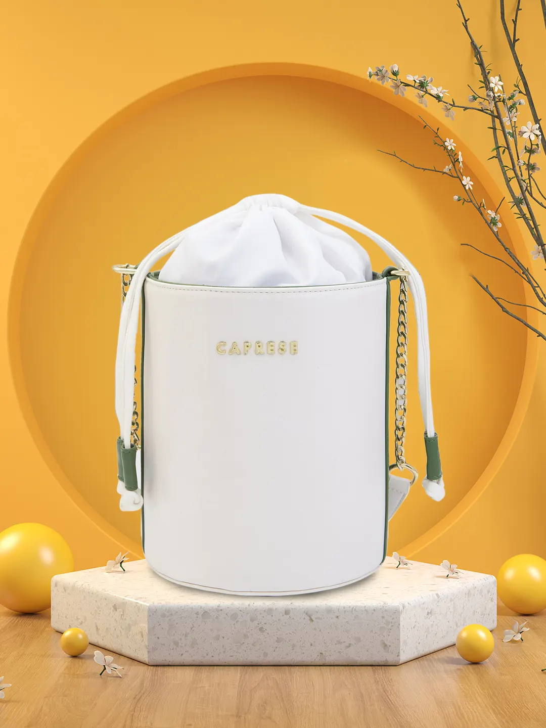 Caprese Lizzy Medium Cream Drawstring Sling Bag - Image 2