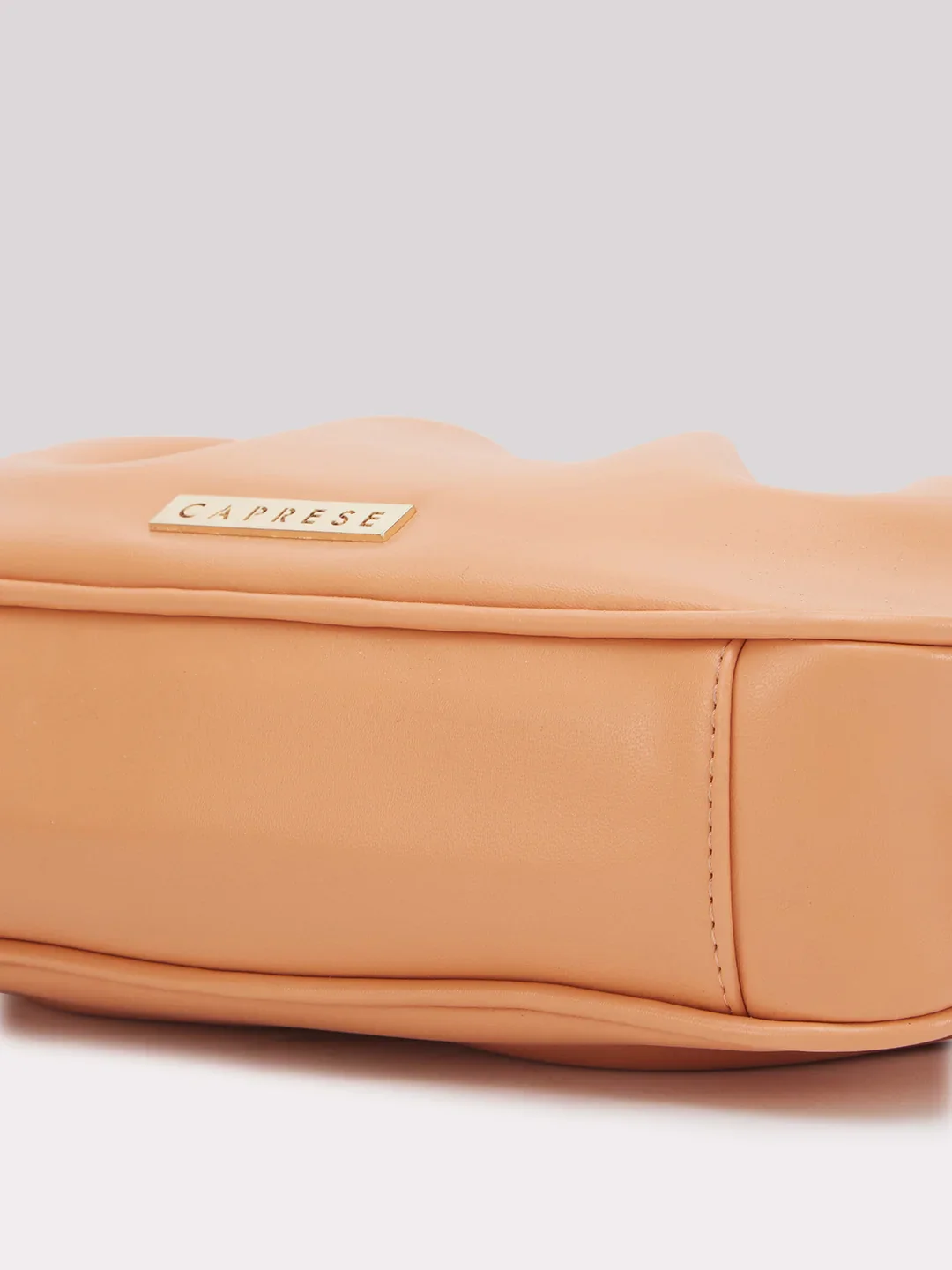 Caprese Pierre Medium Peach Sling Bag - Image 9