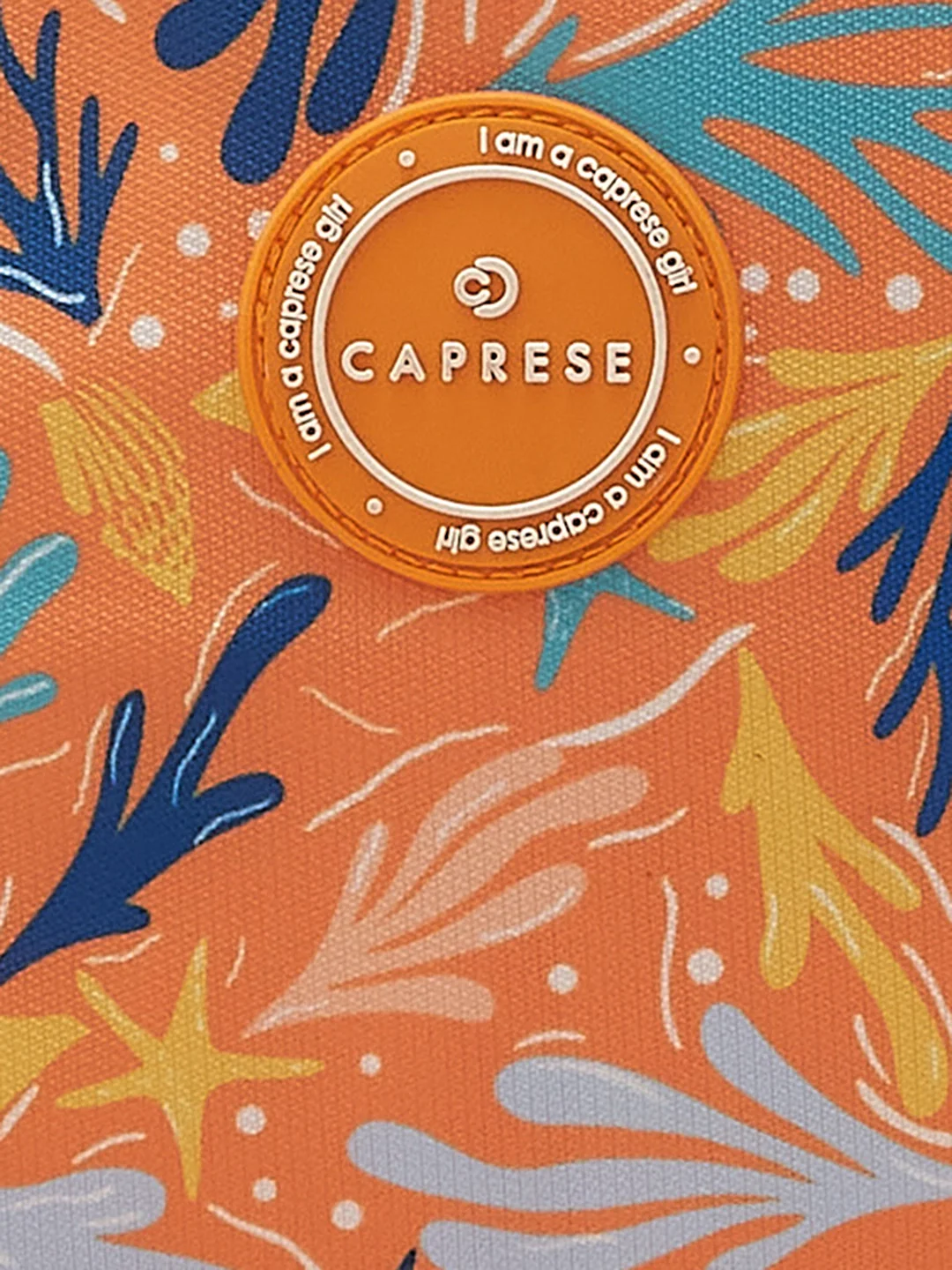 Caprese Xenia Medium Orange Printed Backpack - Image 5