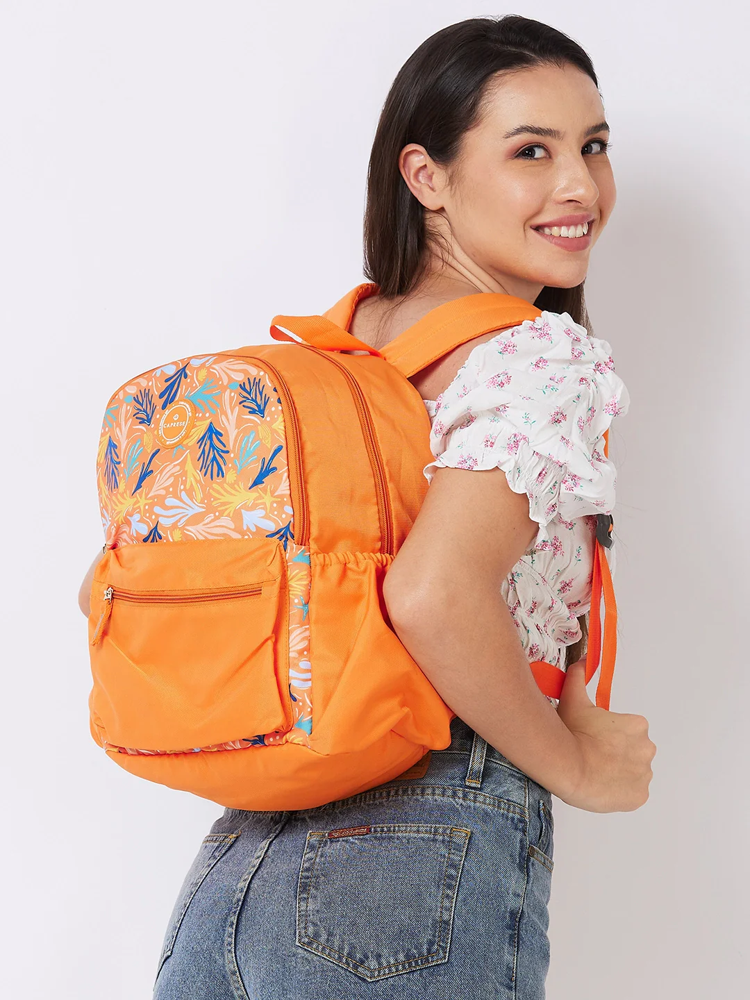 Caprese Xenia Medium Orange Printed Backpack - Image 6