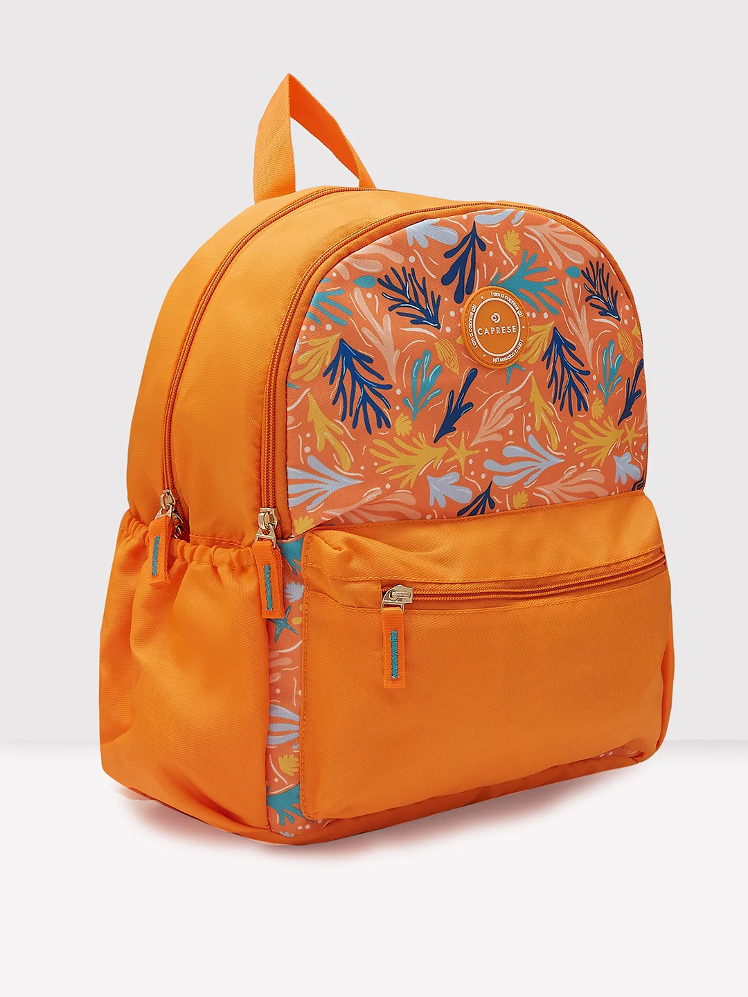 Caprese Xenia Medium Orange Printed Backpack - Image 8
