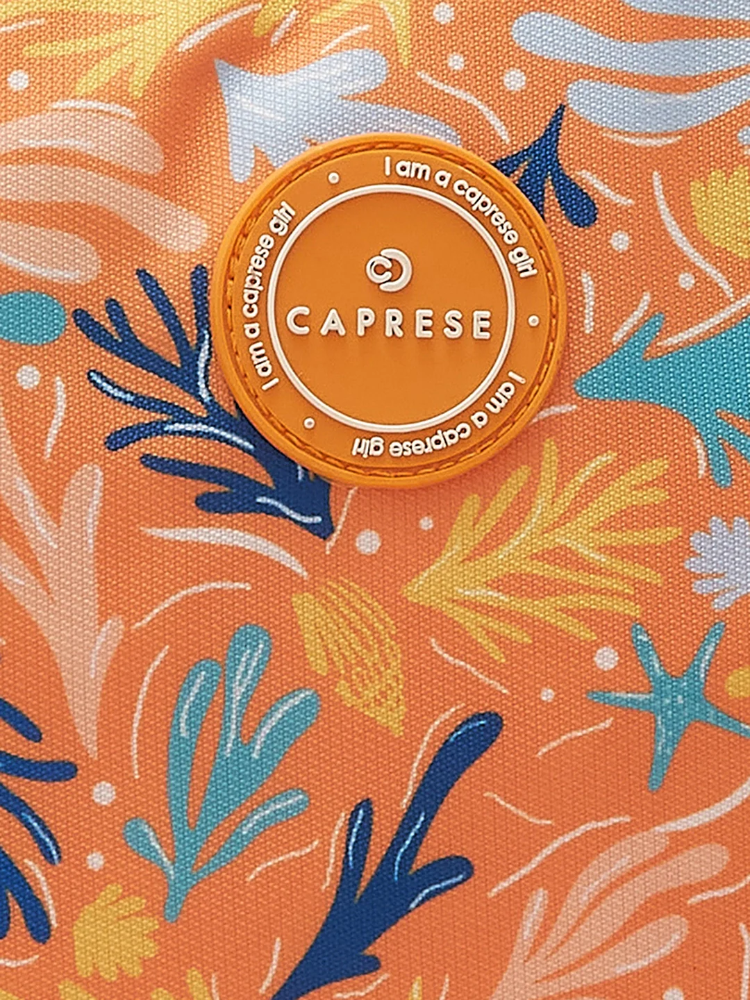 Caprese Xenia Medium Orange Printed Backpack - Image 8