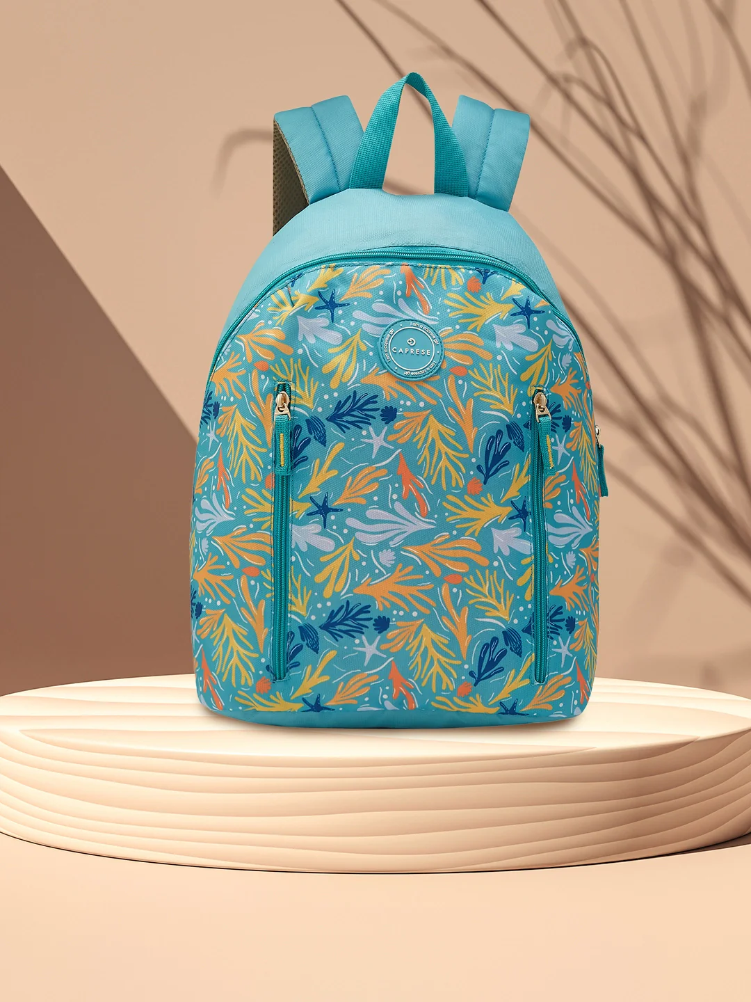 Caprese Xenia Medium Turquoise Printed Backpack - Image 11