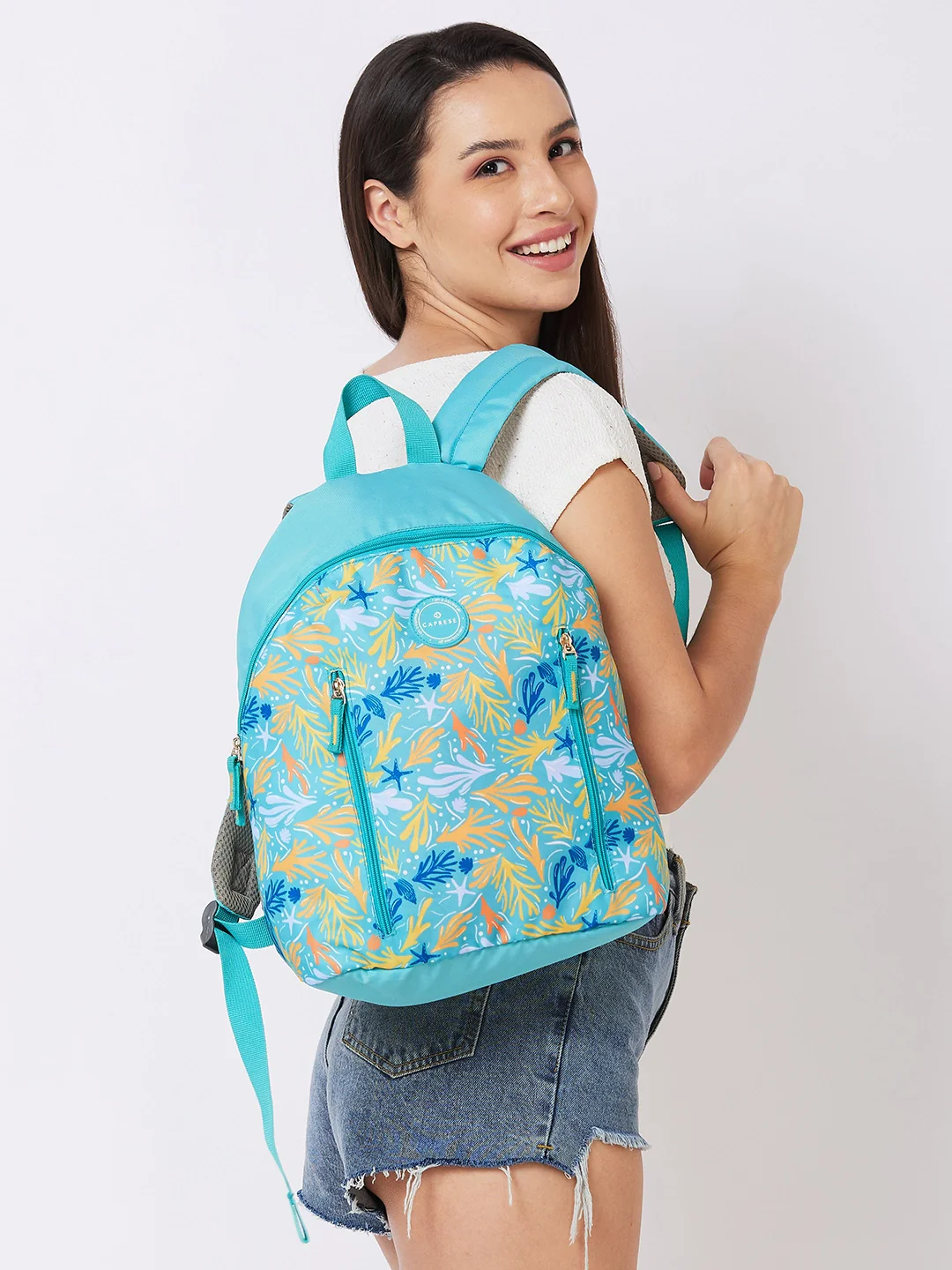 Caprese Xenia Medium Turquoise Printed Backpack - Image 9