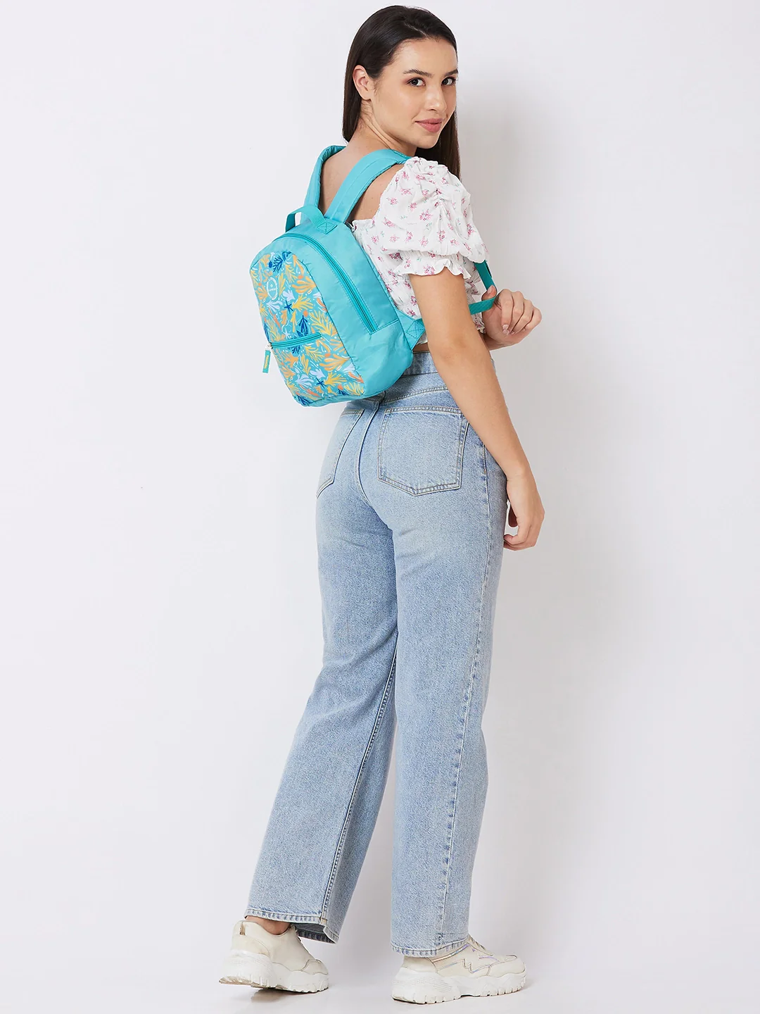 Caprese Xenia Small Turquoise Printed Backpack - Image 2